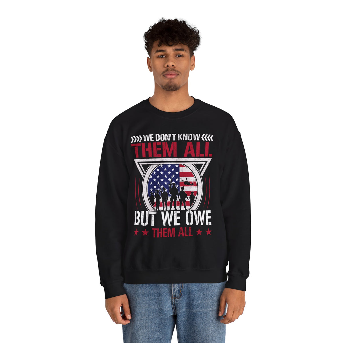 Model wearing the We Don't Know Them All But We Owe Them All Sweatshirt