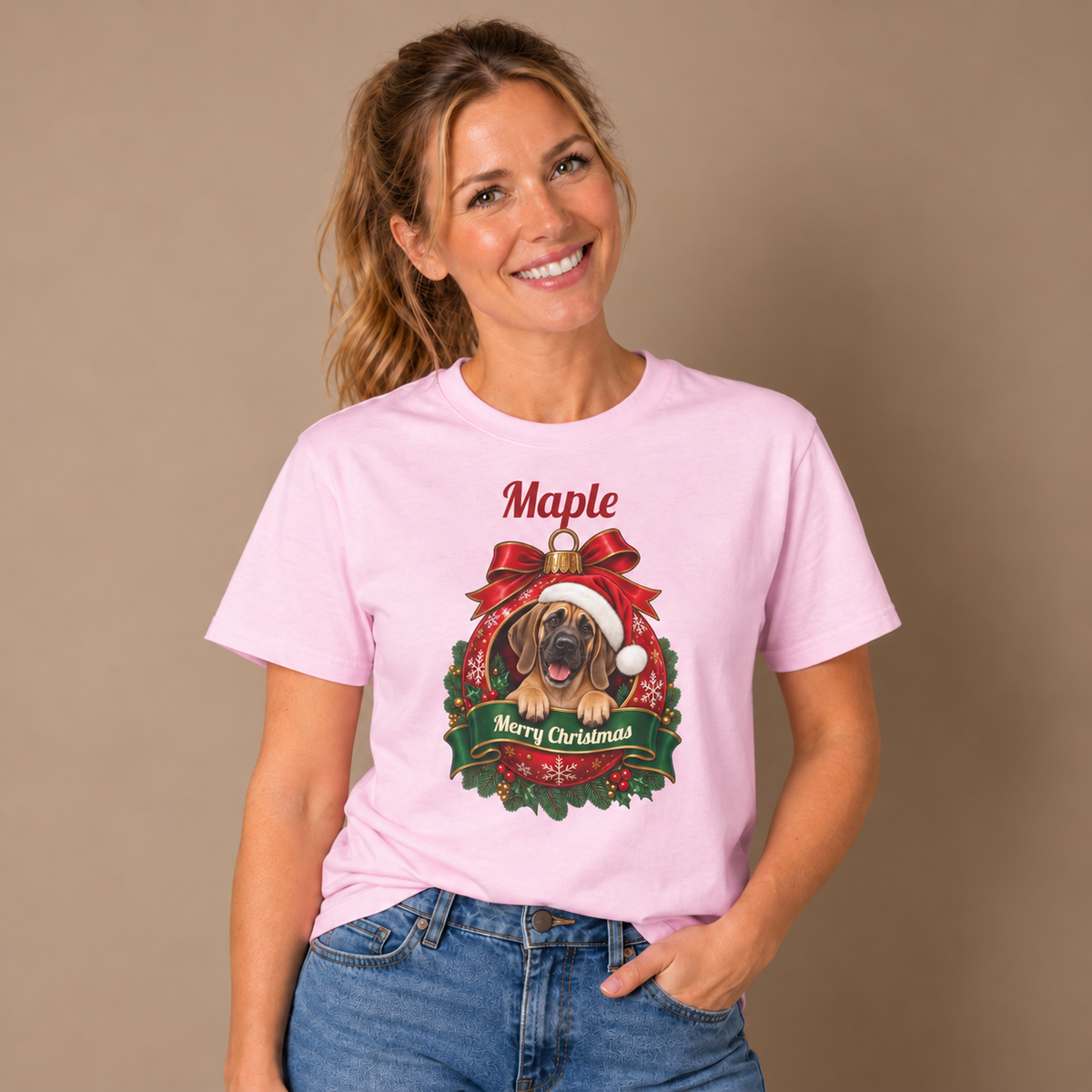 Woman wearing the Light Pink Personalized Fawn Great Dane Christmas T-Shirt with jeans
