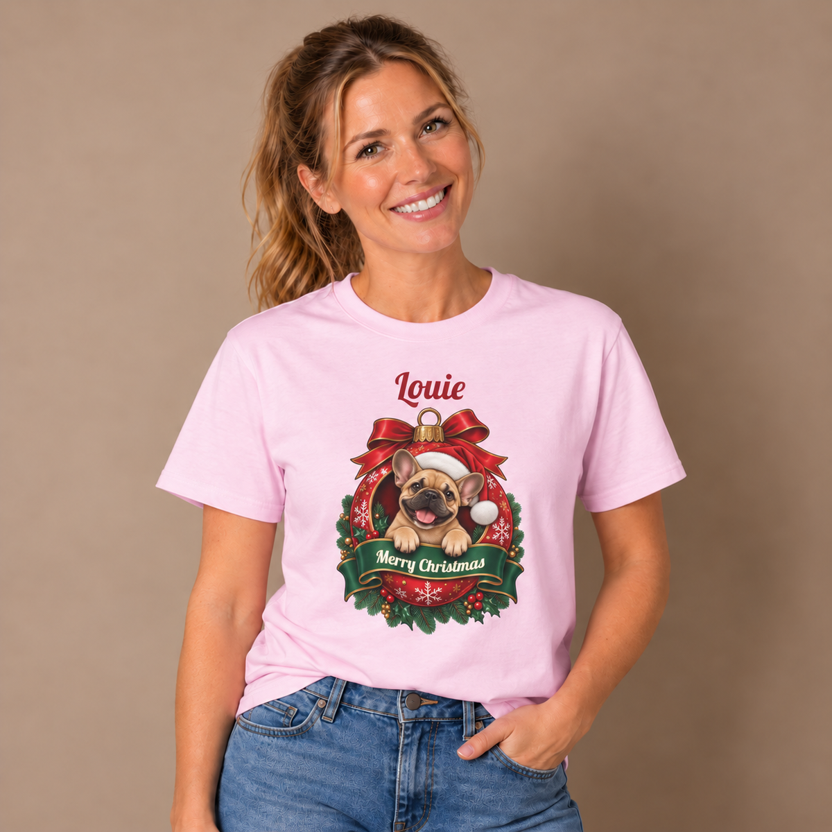 Woman wearing the Light Pink Personalized French Bulldog Christmas T-Shirt with jeans