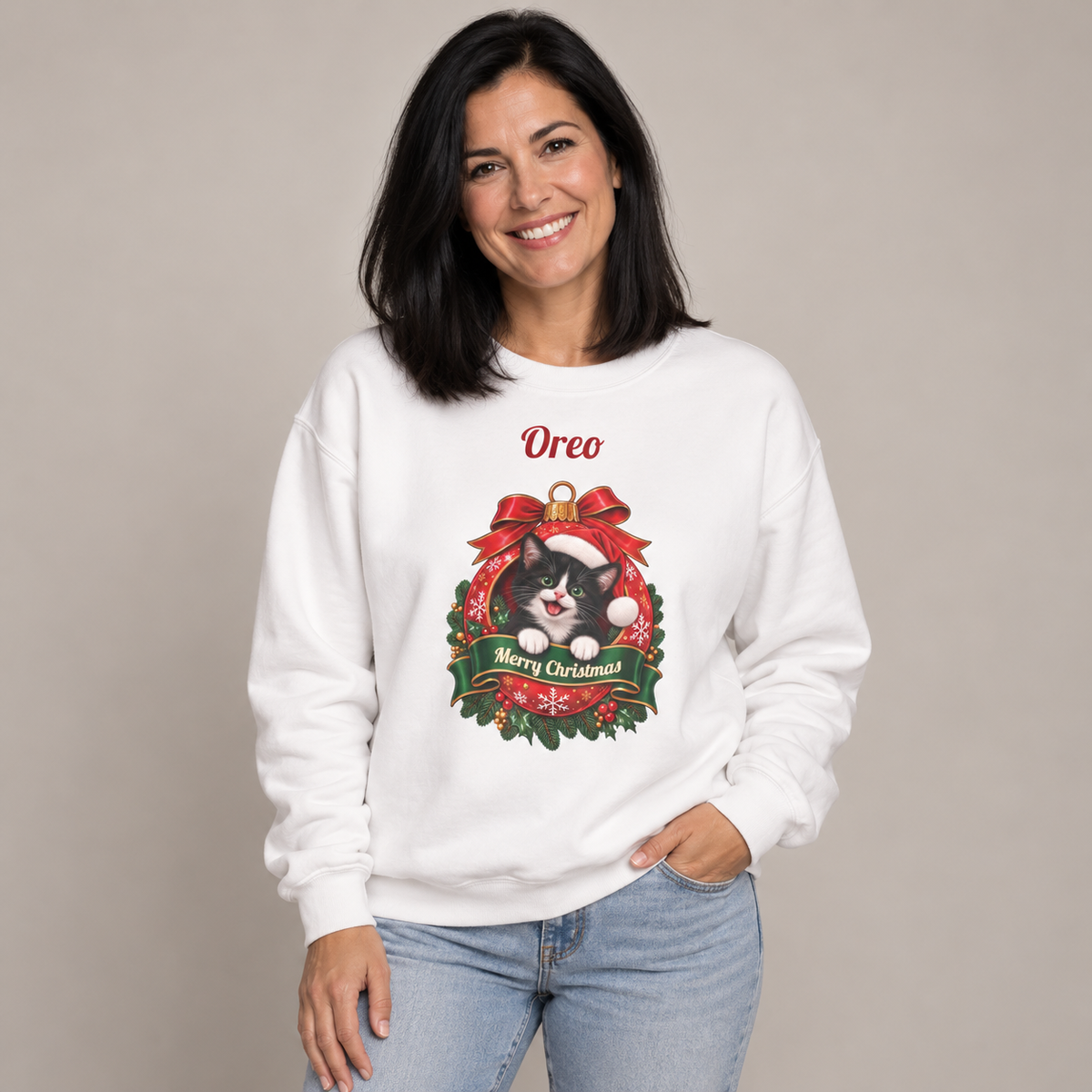 Woman wearing the White Personalized Tuxedo Cat Christmas Sweatshirt, studio photo