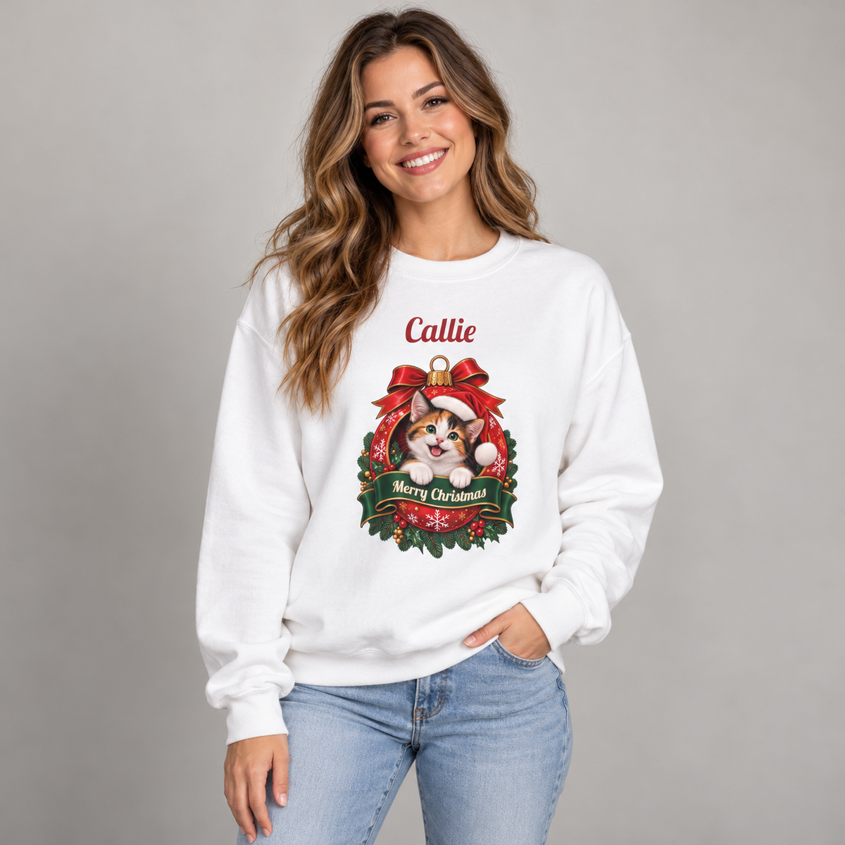 Woman wearing the White Personalized Calico Cat Christmas Sweatshirt, studio photo