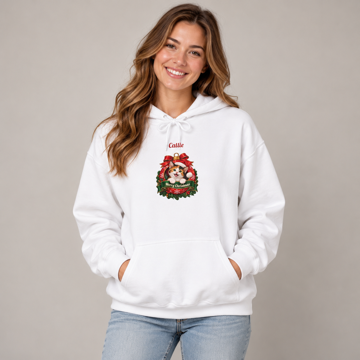 Woman wearing the White Personalized Calico Cat Christmas Hoodie, studio photo