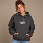 Woman wearing the Dark Heather Judging You Silently Cat Hoodie, studio photo