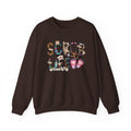 Dark Chocolate Scrub Life nurse sweatshirt with patterned lettering, stethoscope and clogs, front view