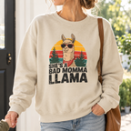 Woman wearing the sand She's A Bad Momma Llama Sweatshirt holding a child's hand