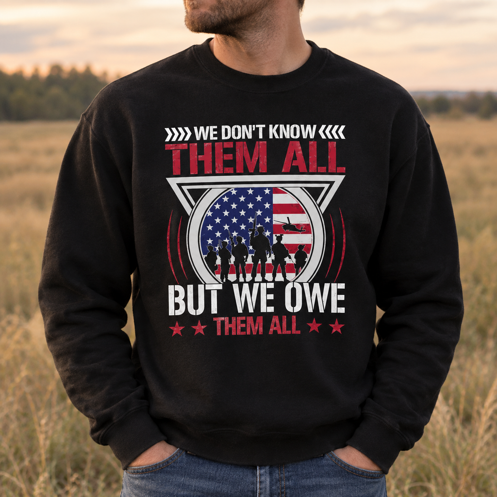 Model wearing the We Don't Know Them All But We Owe Them All Sweatshirt
