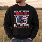 Model wearing the We Don't Know Them All But We Owe Them All Sweatshirt