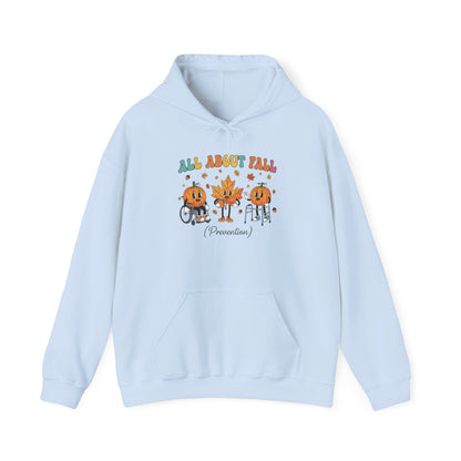 Light blue All About Fall Prevention hoodie with retro pumpkin and leaf characters