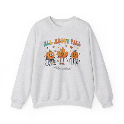 Ash grey All About Fall Prevention sweatshirt with retro pumpkin and leaf characters