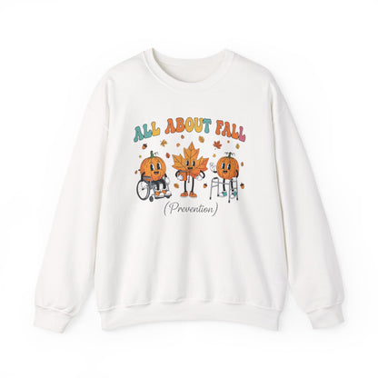 White All About Fall Prevention sweatshirt with retro pumpkin and leaf characters