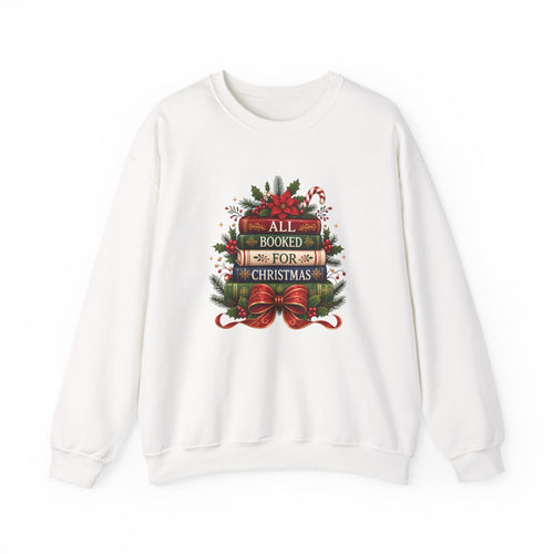 White All Booked For Christmas sweatshirt with a stack of vintage books, poinsettia and red bow, front view