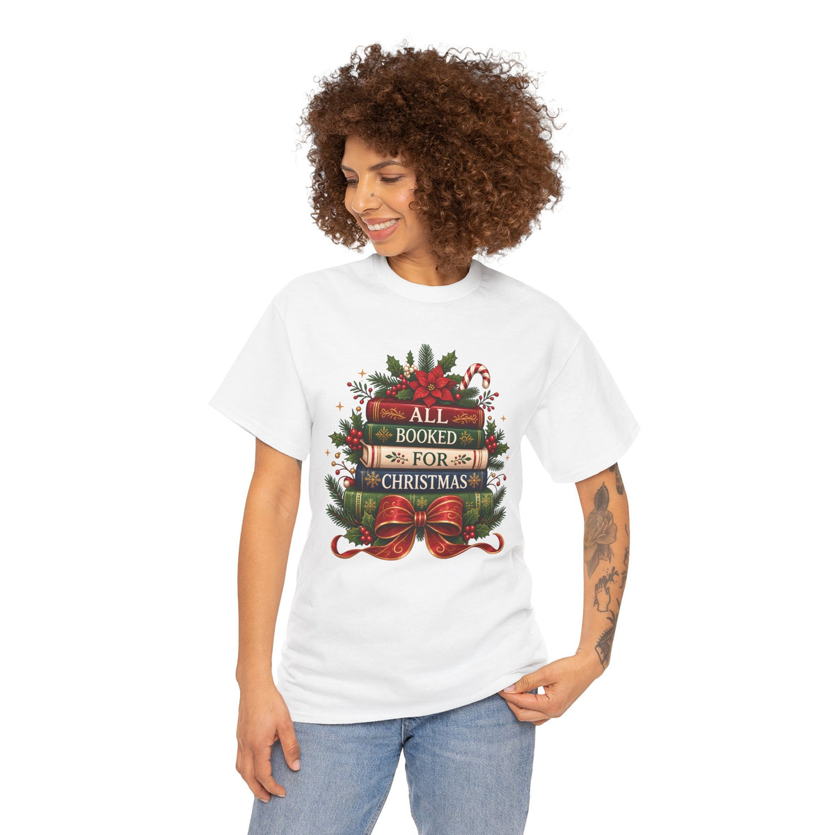 Model wearing the white All Booked For Christmas Book Lover T-Shirt