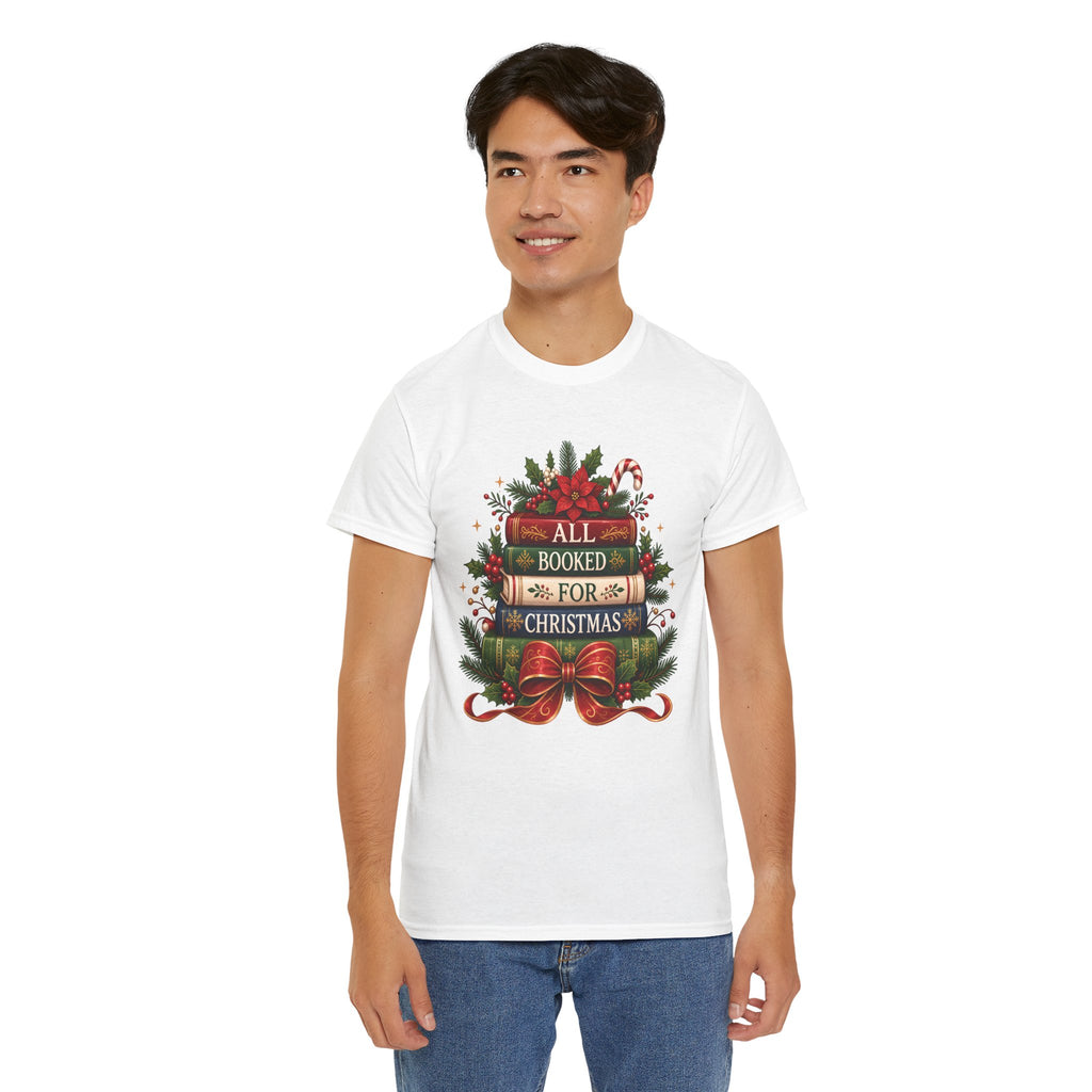 Model wearing the white All Booked For Christmas Book Lover T-Shirt