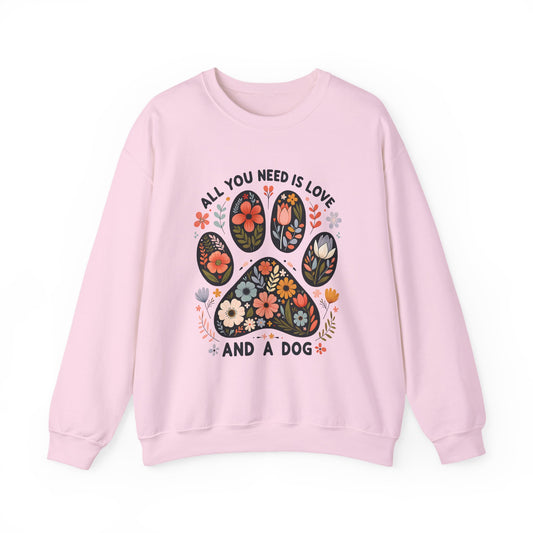 Light pink All You Need Is Love And A Dog sweatshirt with floral dog paw print