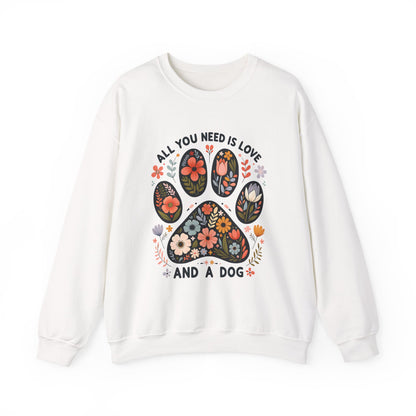 White All You Need Is Love And A Dog sweatshirt with floral dog paw print