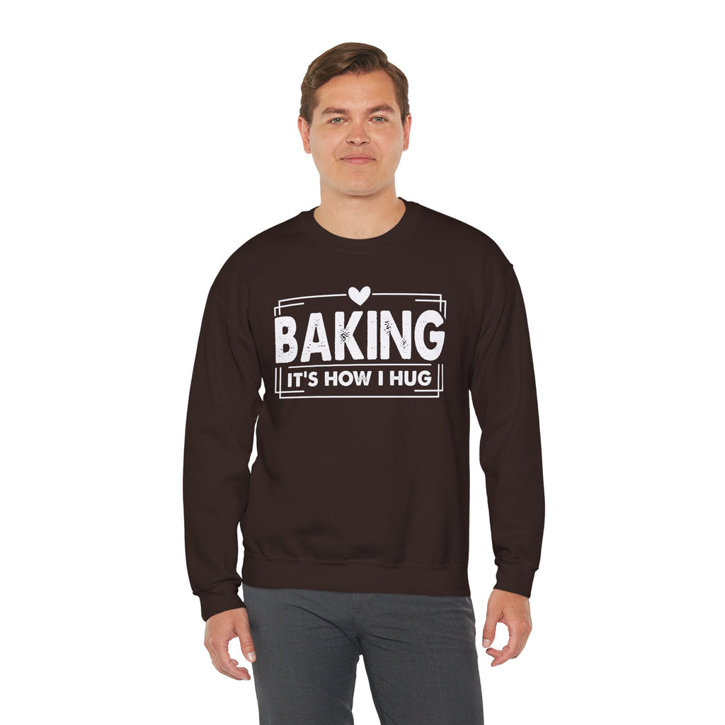Man wearing the dark chocolate Baking It's How I Hug Sweatshirt