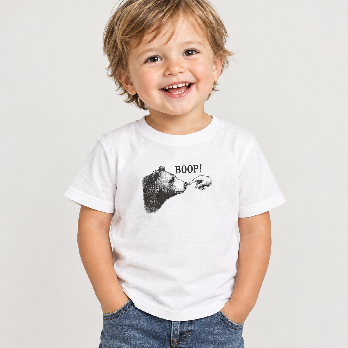 Toddler wearing the White Bear Boop Funny Toddler T-Shirt with jeans