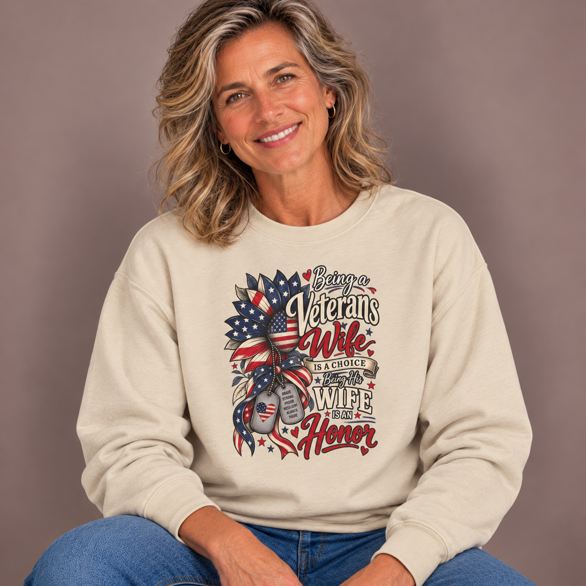 Woman wearing the Sand Being A Veteran's Wife Is A Choice Being His Wife Is An Honor Sweatshirt with jeans