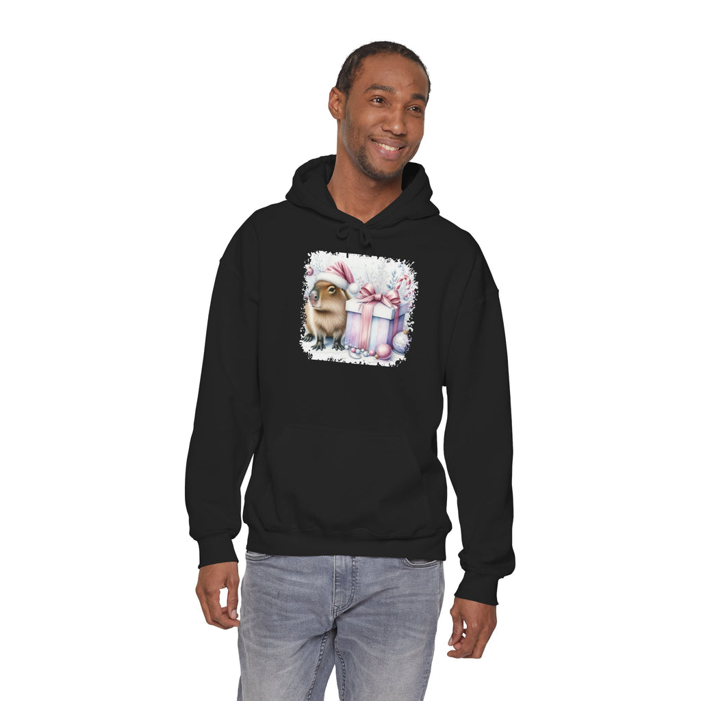 Man wearing the Black Capybara With Christmas Present Hoodie, second model