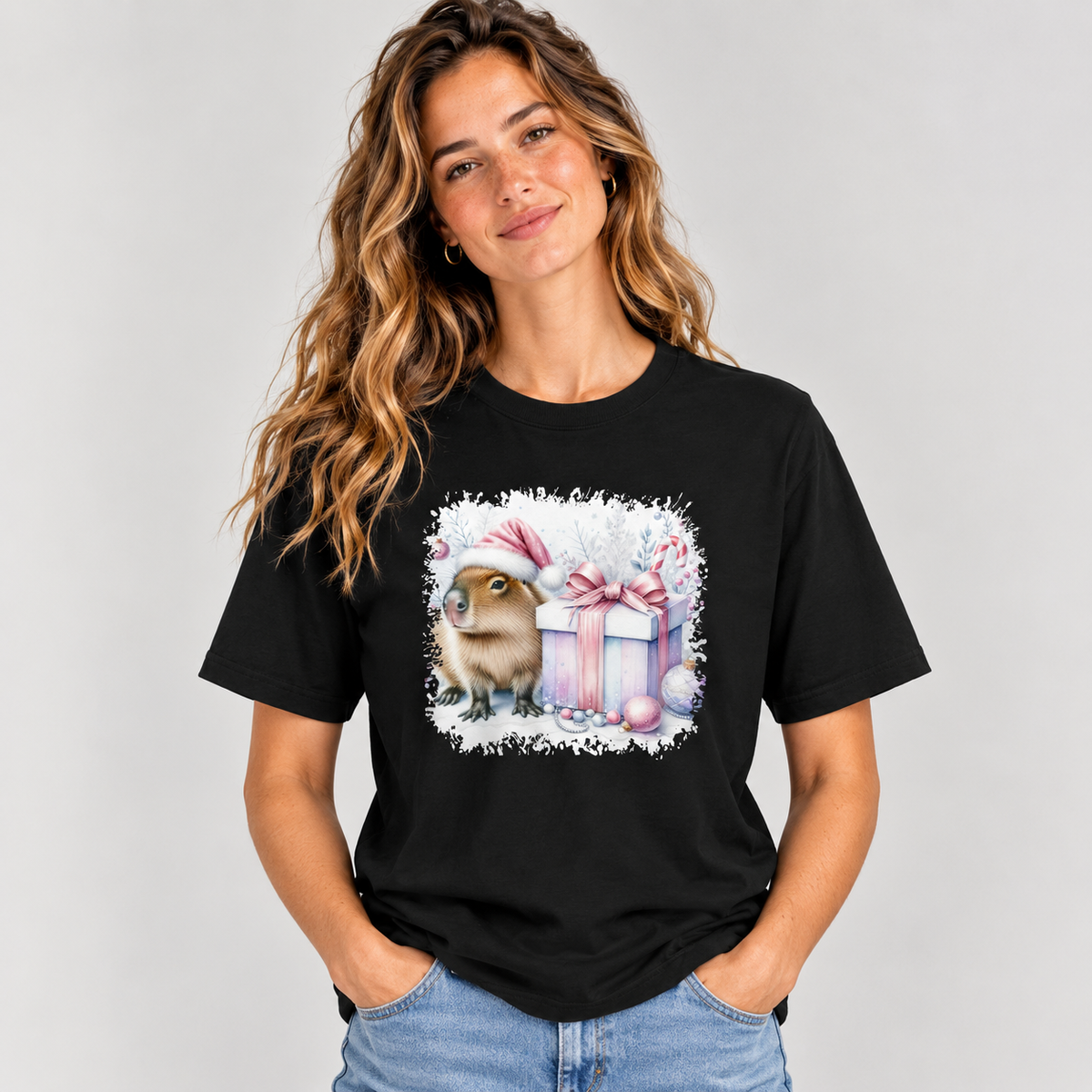 Woman wearing the Black Capybara With Christmas Present T-Shirt with jeans