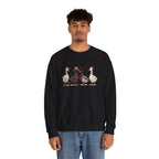 Man wearing the Black Christmas Geese In Santa Hats Sweatshirt