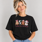 Woman wearing the Black Cookies For Two Please Christmas T-Shirt with jeans