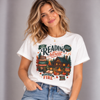Woman wearing the White Cozy Cabin Reading Retreat T-Shirt with jeans