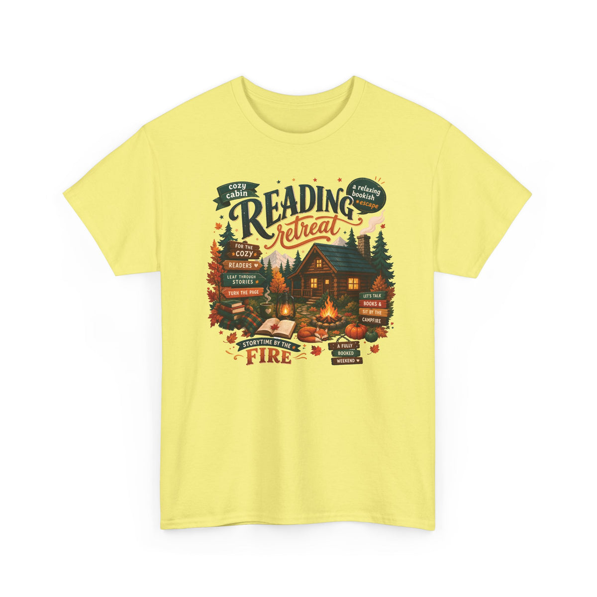 Cornsilk Cozy Cabin Reading Retreat t-shirt with a glowing log cabin in the pines, stacks of books and a crackling fire, front view
