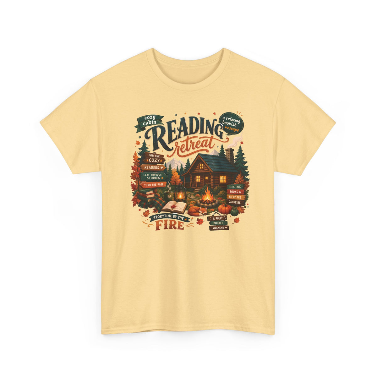 Yellow Haze Cozy Cabin Reading Retreat t-shirt with a glowing log cabin in the pines, stacks of books and a crackling fire, front view