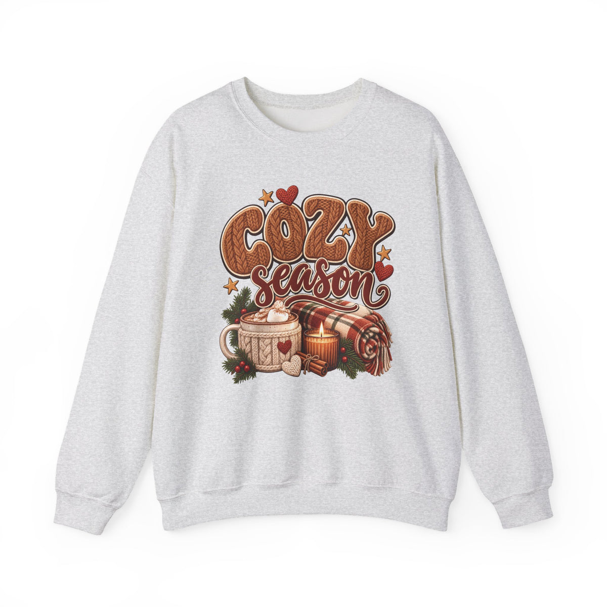 Ash Cozy Season sweatshirt with cable-knit lettering, hot cocoa, a candle and a plaid blanket, front view