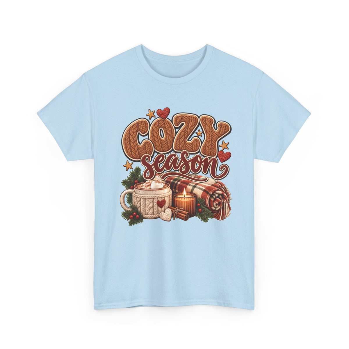 Light Blue Cozy Season t-shirt with cable-knit lettering, hot cocoa, a candle and a plaid blanket, front view