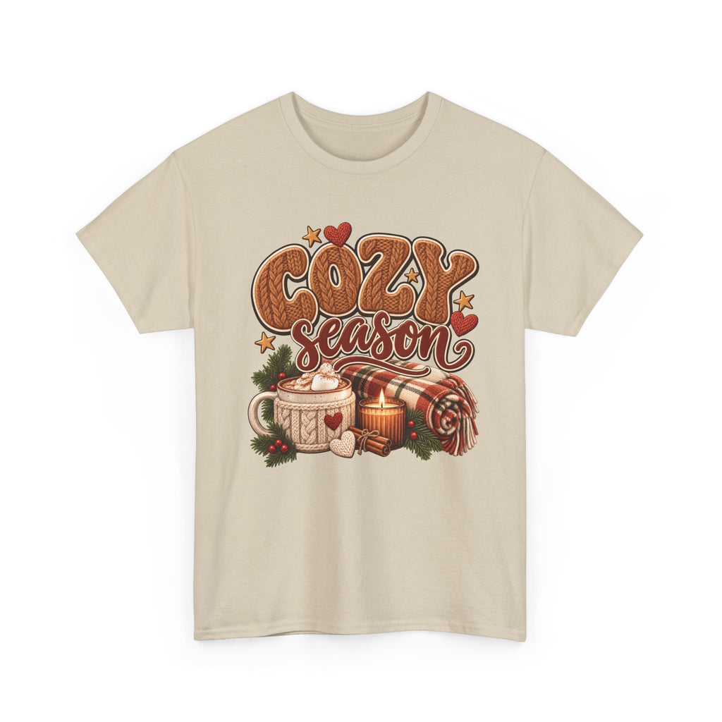 Sand Cozy Season t-shirt with cable-knit lettering, hot cocoa, a candle and a plaid blanket, front view