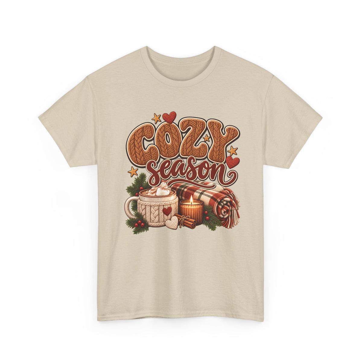 Sand Cozy Season t-shirt with cable-knit lettering, hot cocoa, a candle and a plaid blanket, front view