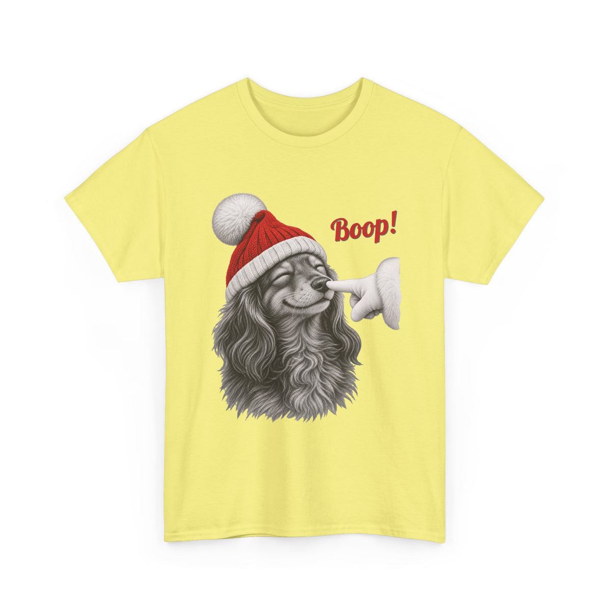 Cornsilk Dachshund Boop Christmas t-shirt with a smiling dachshund in a Santa hat getting a nose boop, front view