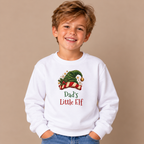 Girl wearing the White Dad's Little Elf Kids T-Shirt