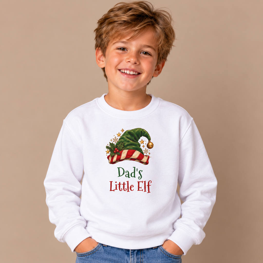 Boy wearing the White Dad's Little Elf Youth Sweatshirt