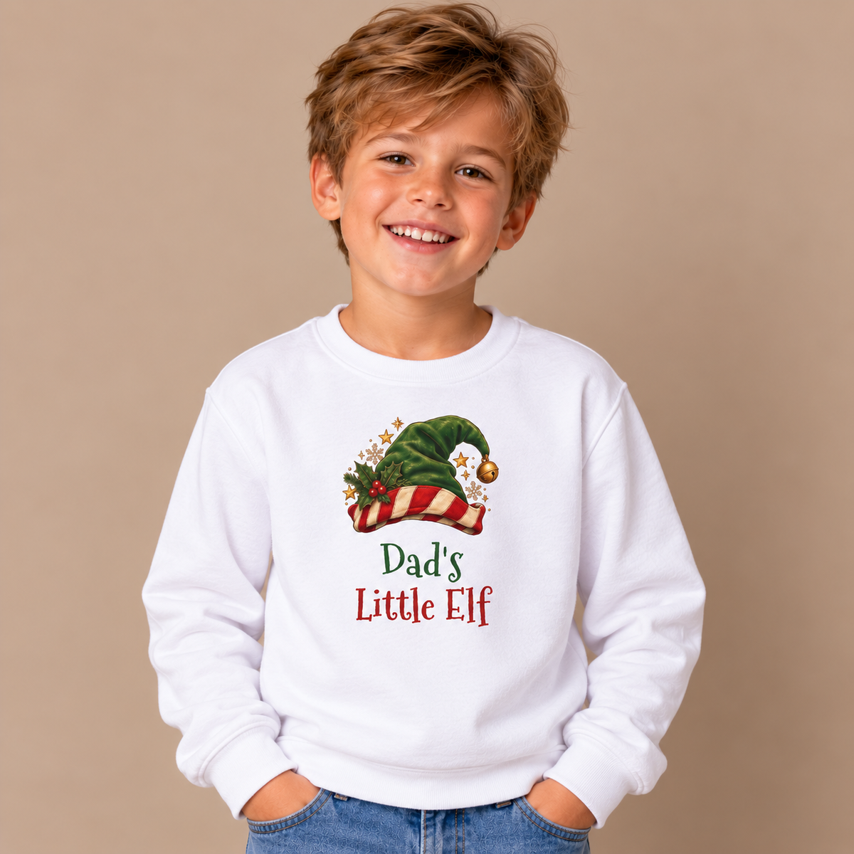 Boy wearing the White Dad's Little Elf Youth Sweatshirt