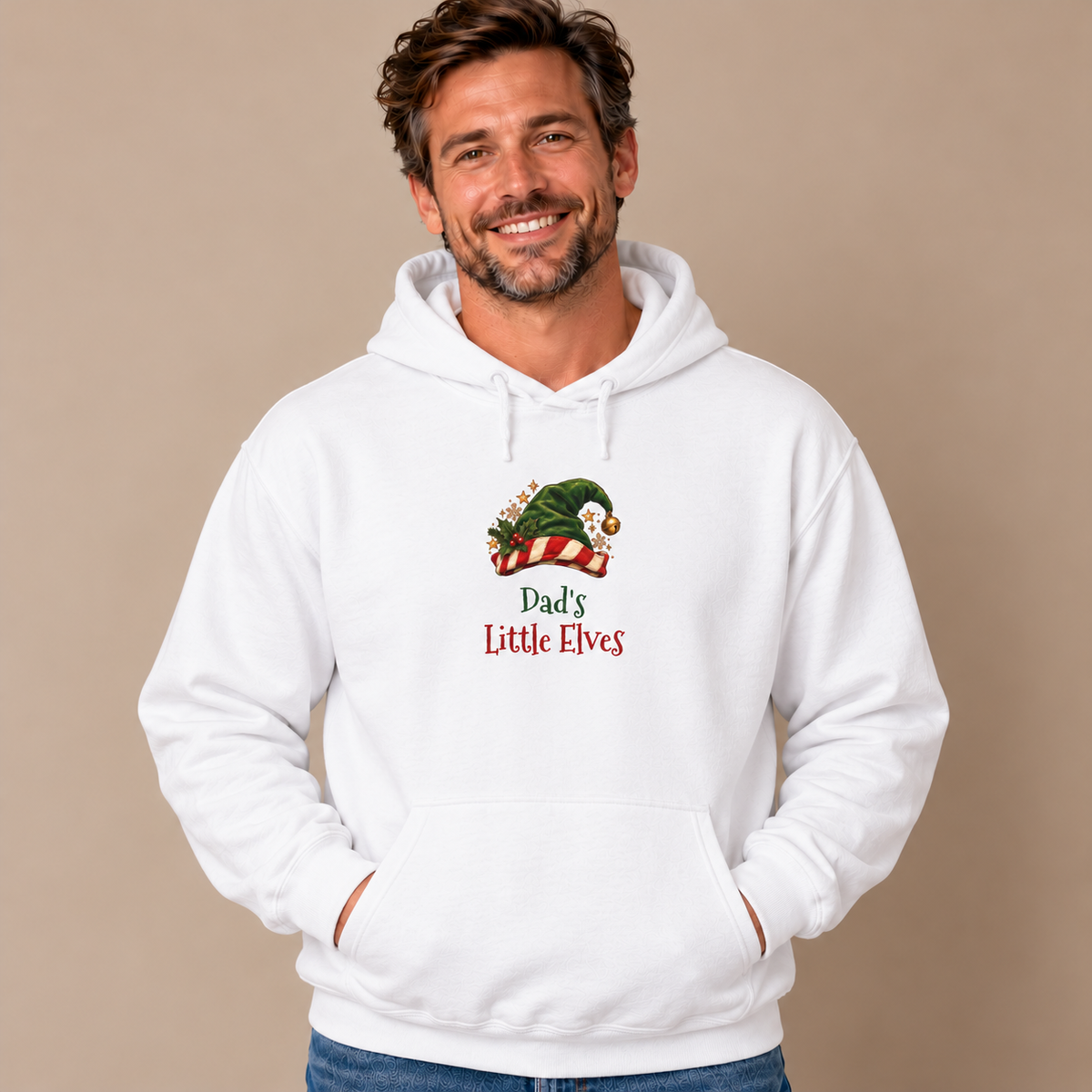Man wearing the White Dad's Little Elves Hoodie with jeans