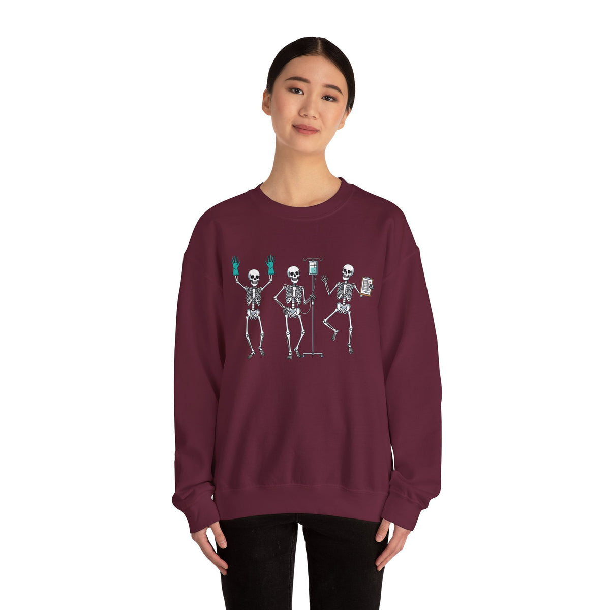 Woman wearing the Dancing skeleton nurse sweatshirt, front view