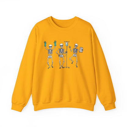 Gold Dancing skeleton nurse sweatshirt with three dancing skeletons in teal gloves, front view