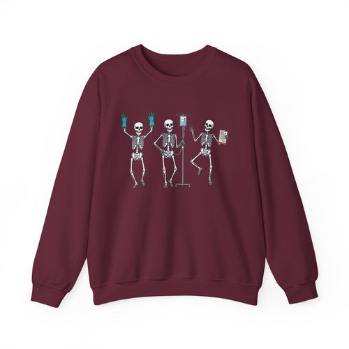 Maroon Dancing skeleton nurse sweatshirt with three dancing skeletons in teal gloves, front view