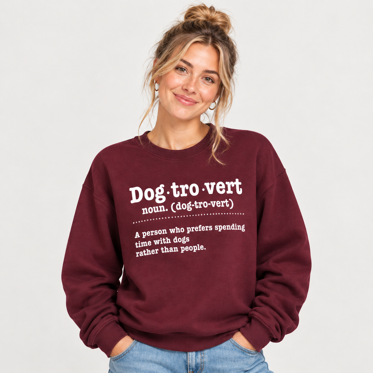 Woman wearing the Dogtrovert definition sweatshirt, hands in pocket