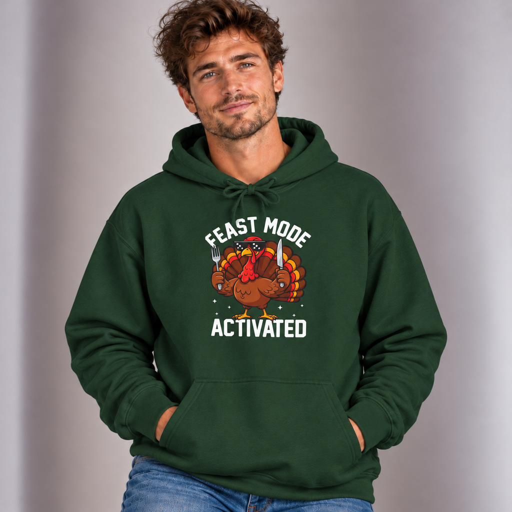 Man wearing the Forest Green Feast Mode Activated Hoodie with jeans