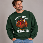 Man wearing the Forest Green Feast Mode Activated Sweatshirt with jeans