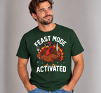 Man wearing the Forest Green Feast Mode Activated T-Shirt with jeans
