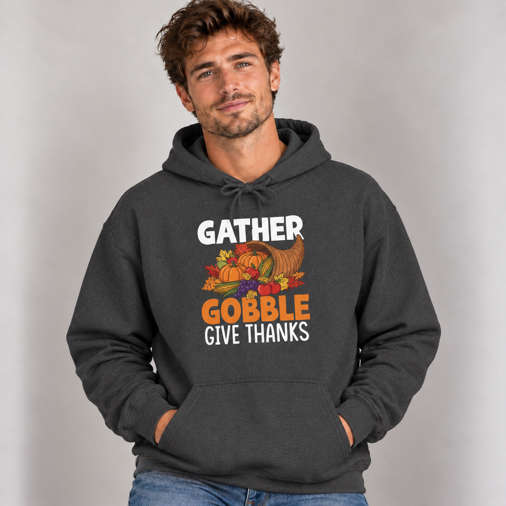 Man wearing the Dark Heather Gather Gobble Give Thanks Hoodie with jeans