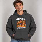 Man wearing the Dark Heather Gather Gobble Give Thanks Hoodie with jeans