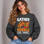 Woman wearing the Dark Heather Gather Gobble Give Thanks Sweatshirt with jeans