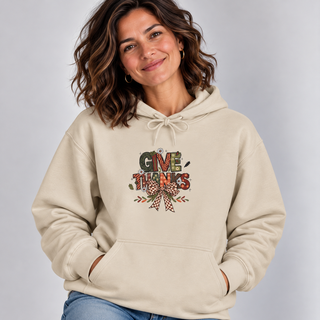 Woman wearing the Sand Give Thanks Hoodie with jeans