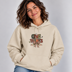 Woman wearing the Sand Give Thanks Hoodie with jeans